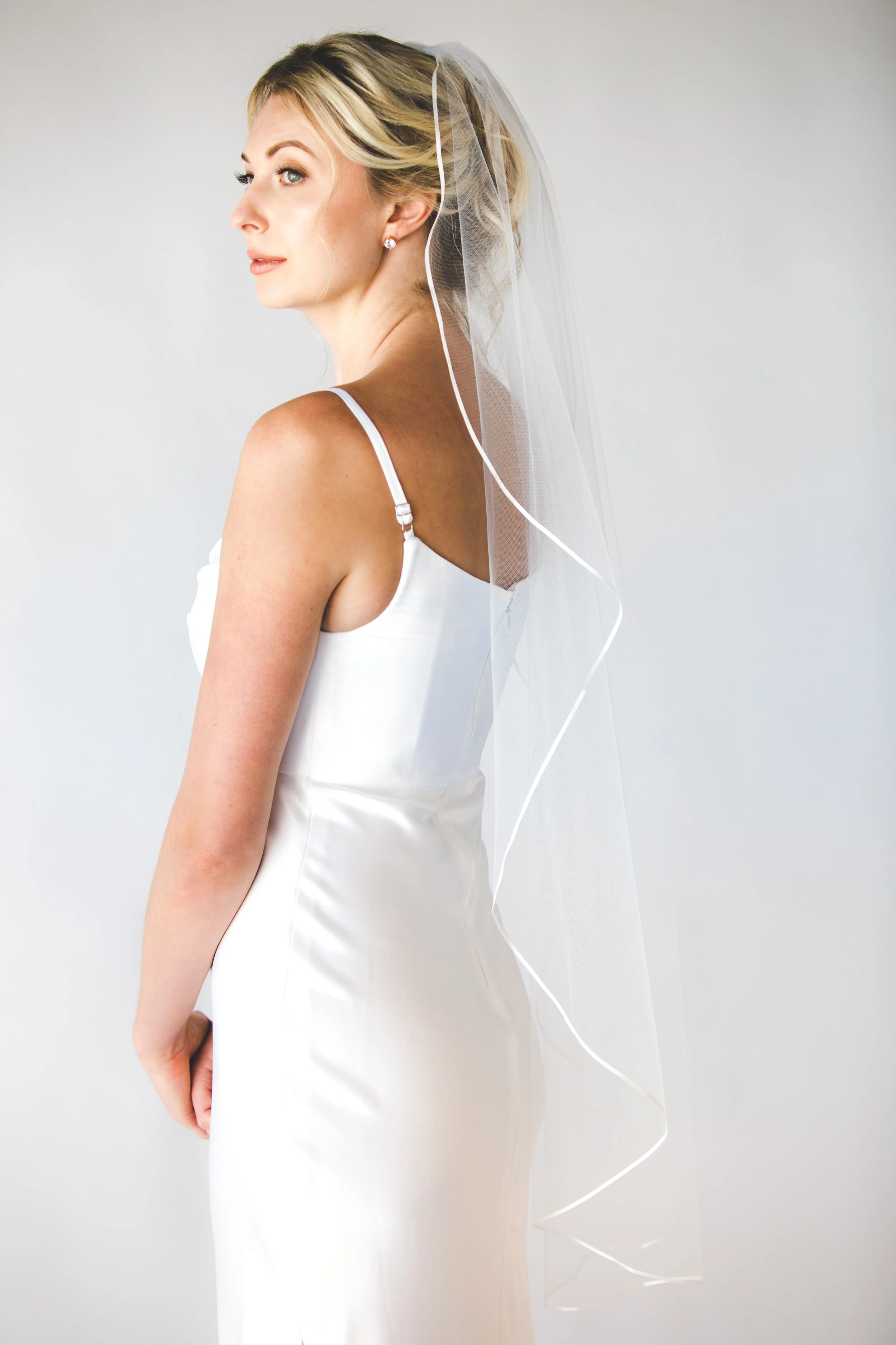Blaise wavy bridal fingertip length veil. — Justine M Couture